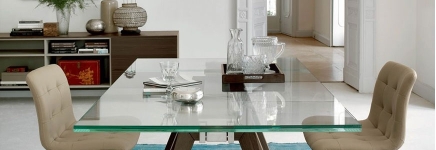 Extendable glass tables